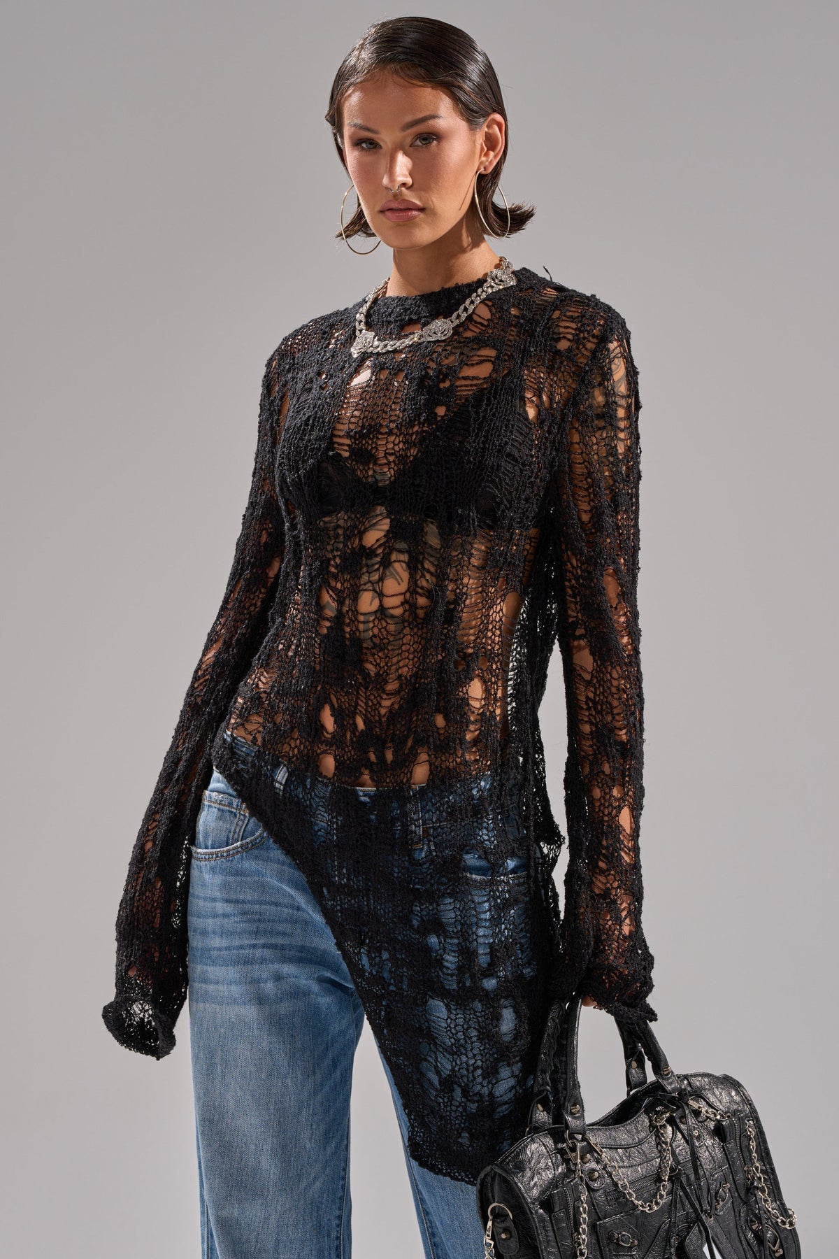 ASYMMETRICAL KNIT SWEATER